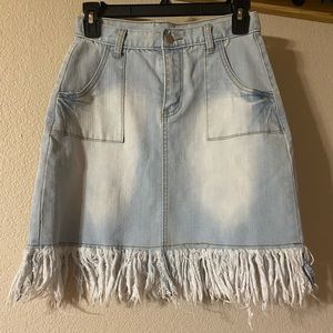 Denim skirt with frayed ends